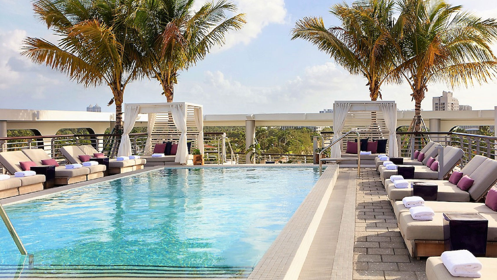 pool with cabanas