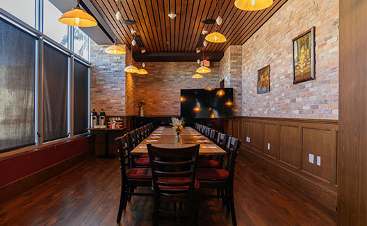 palomar south beach dining room with a table and chairs